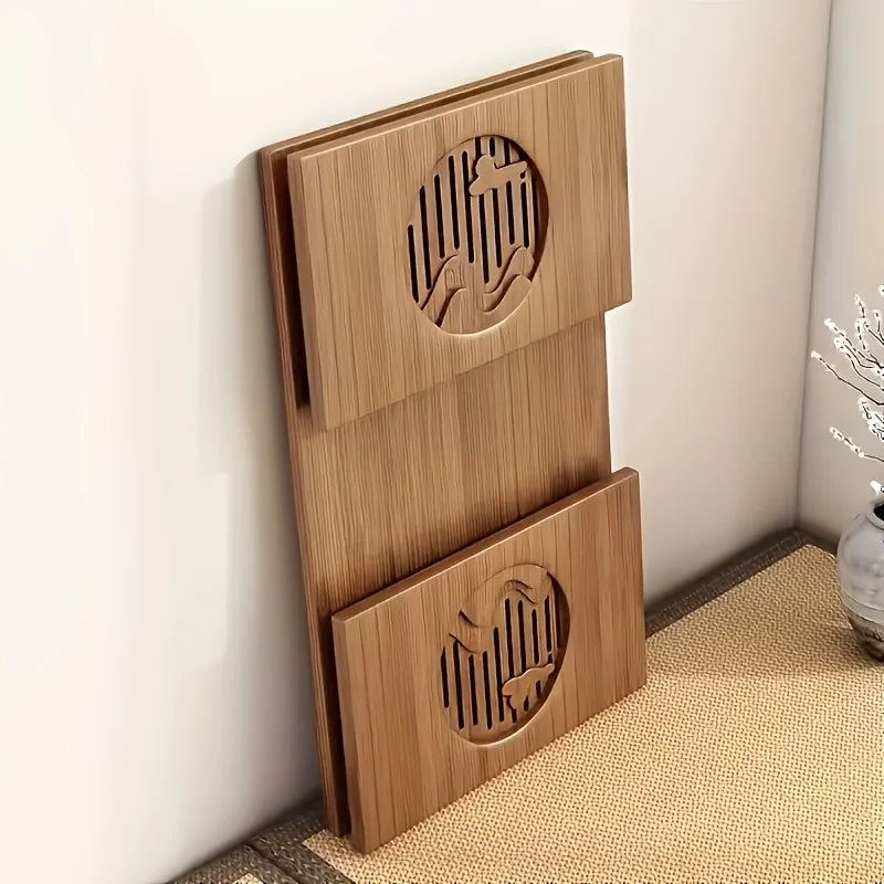 Table_basse_pliable_bambou pliee contre mur